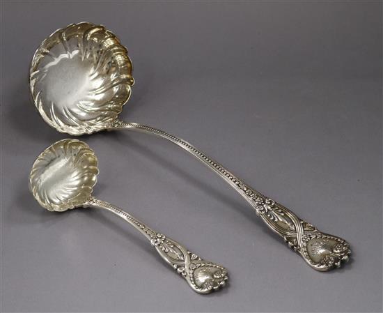 A Tiffany & Co sterling silver soup ladle and matching sauce ladle, 11 oz.